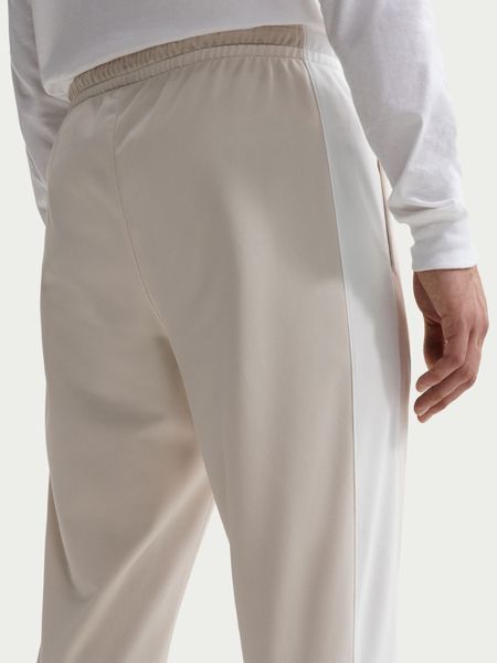 Спортивний костюм чоловічий Nike M Nk Wr Pk Trk Suit (IF1623-104), L, OFC, > 50%, 1-2 дні